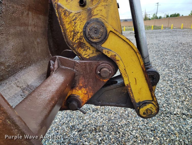 image for item YA0340 2004 John Deere  710G backhoe