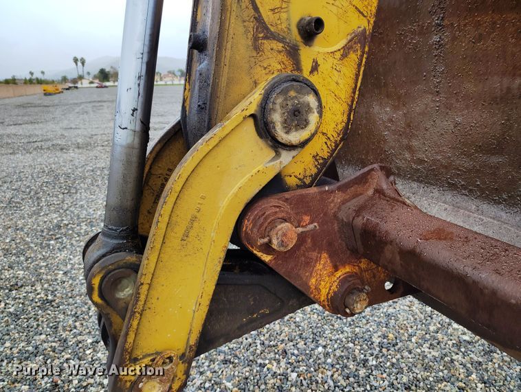 image for item YA0340 2004 John Deere  710G backhoe