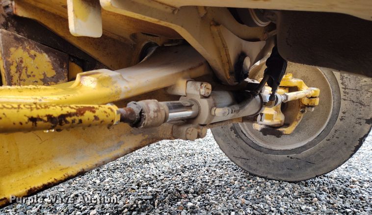 image for item YA0340 2004 John Deere  710G backhoe