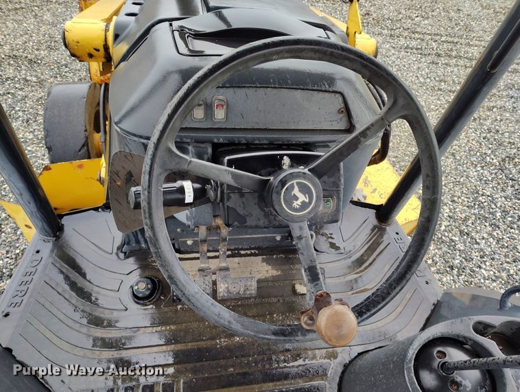 image for item YA0340 2004 John Deere  710G backhoe