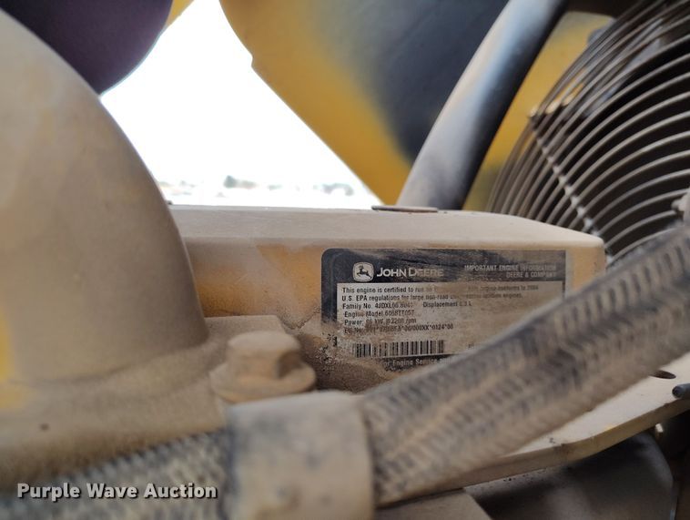 image for item YA0340 2004 John Deere  710G backhoe