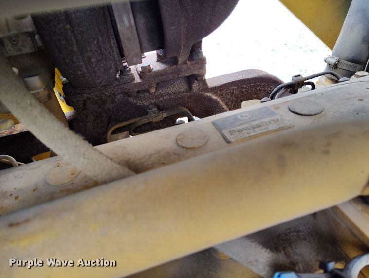 image for item YA0340 2004 John Deere  710G backhoe