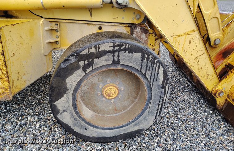 image for item YA0340 2004 John Deere  710G backhoe