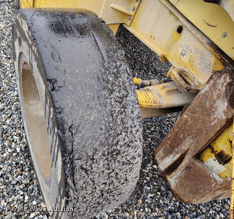 image for item YA0340 2004 John Deere  710G backhoe