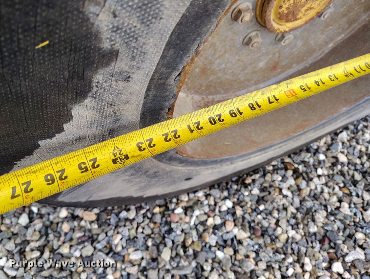 image for item YA0340 2004 John Deere  710G backhoe