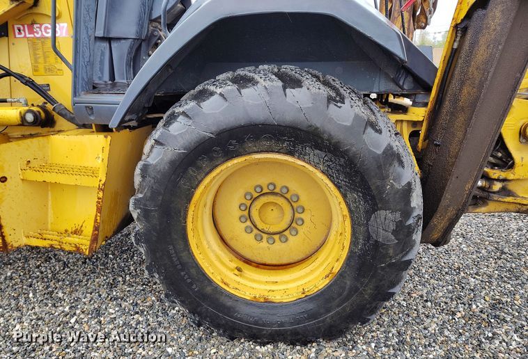 image for item YA0340 2004 John Deere  710G backhoe