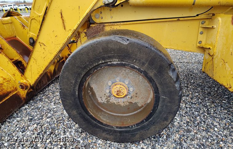 image for item YA0340 2004 John Deere  710G backhoe