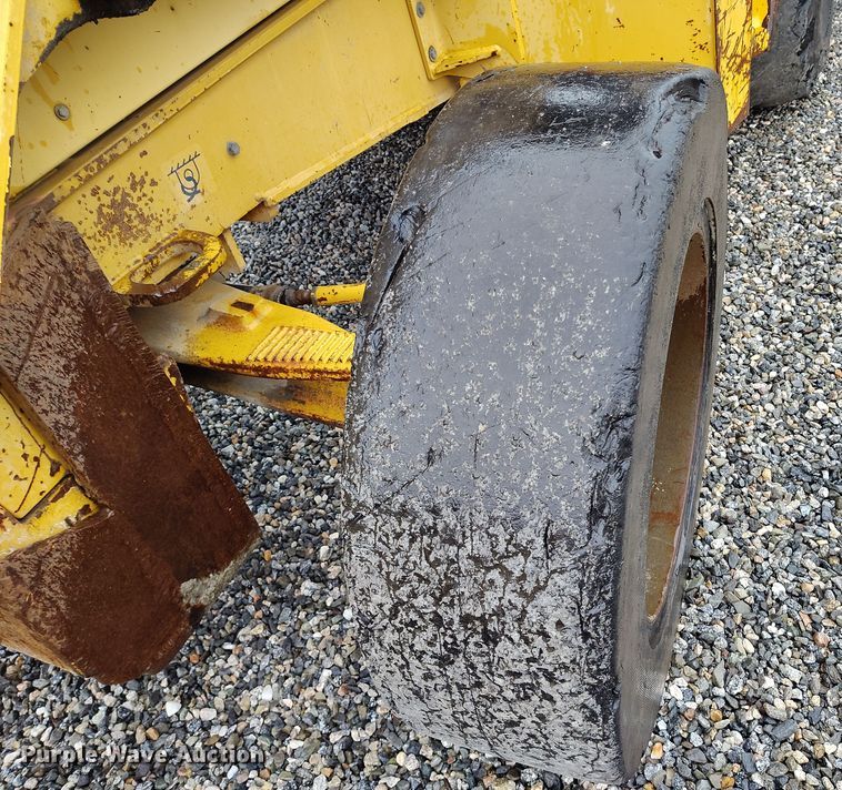 image for item YA0340 2004 John Deere  710G backhoe