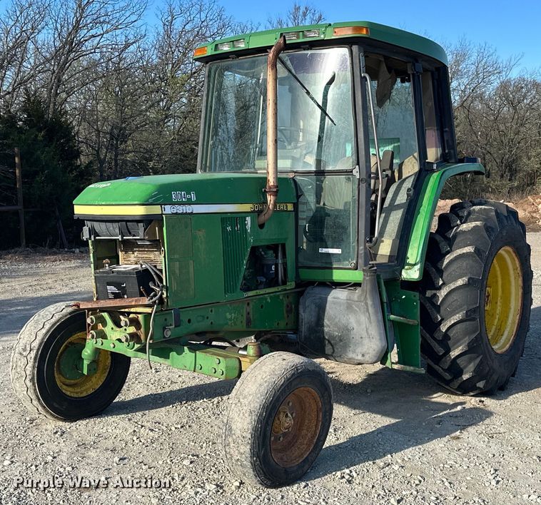 image for item EK0539 2001 John Deere 6310 tractor