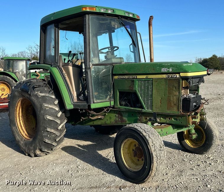 image for item EK0539 2001 John Deere 6310 tractor