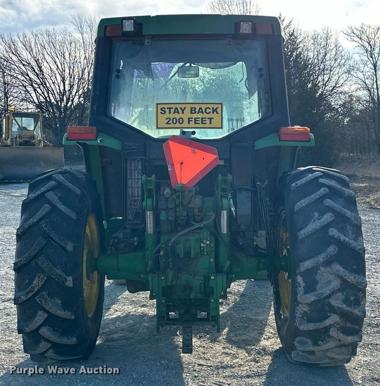 image for item EK0539 2001 John Deere 6310 tractor