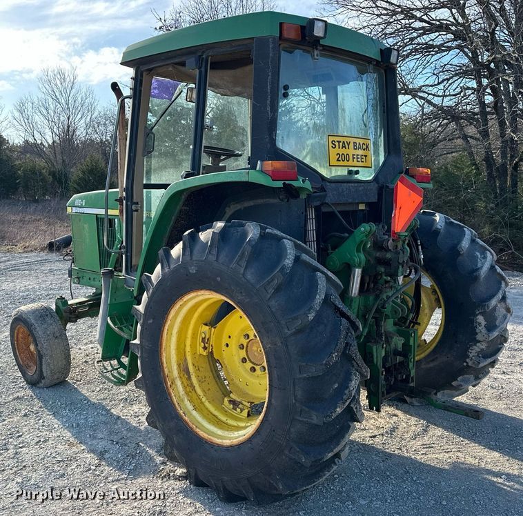 image for item EK0539 2001 John Deere 6310 tractor