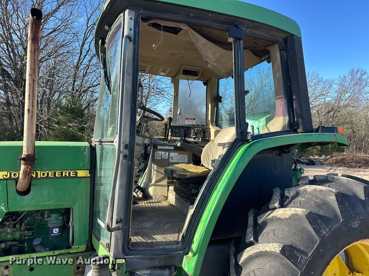 image for item EK0539 2001 John Deere 6310 tractor