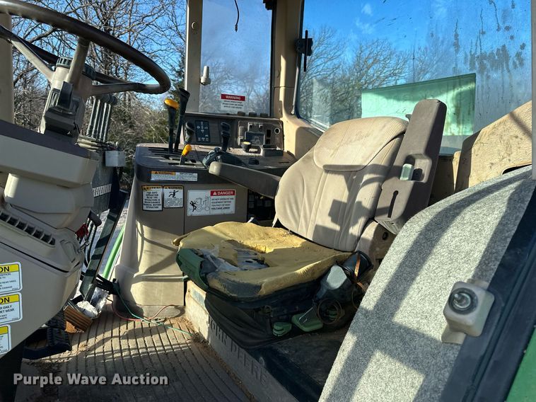 image for item EK0539 2001 John Deere 6310 tractor