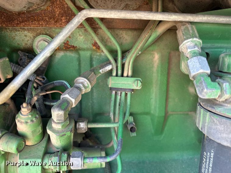 image for item EK0539 2001 John Deere 6310 tractor