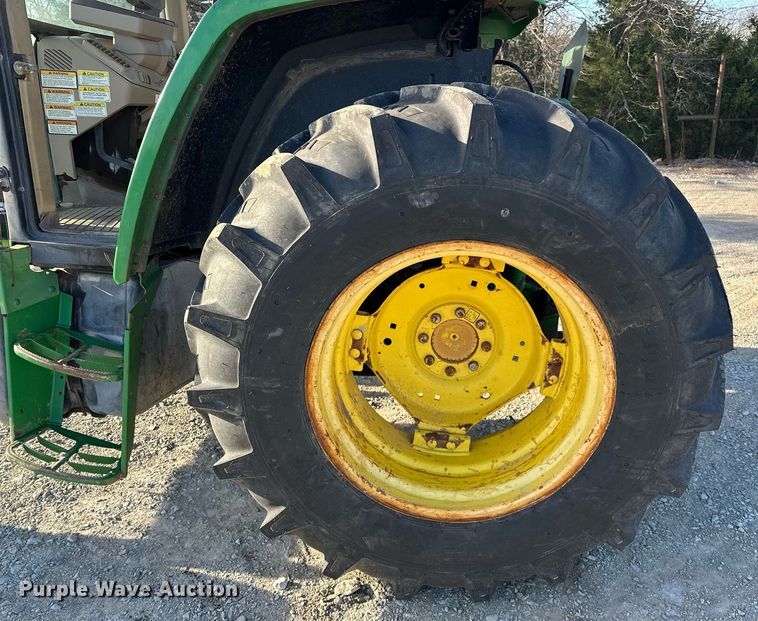 image for item EK0539 2001 John Deere 6310 tractor