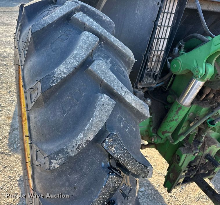 image for item EK0539 2001 John Deere 6310 tractor