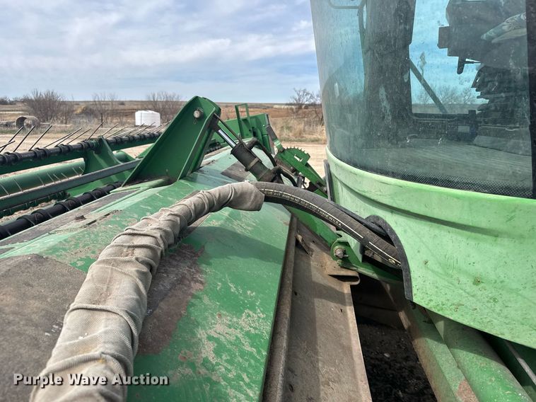 image for item NN9739 1999 John Deere 4890 SP swather / windrower