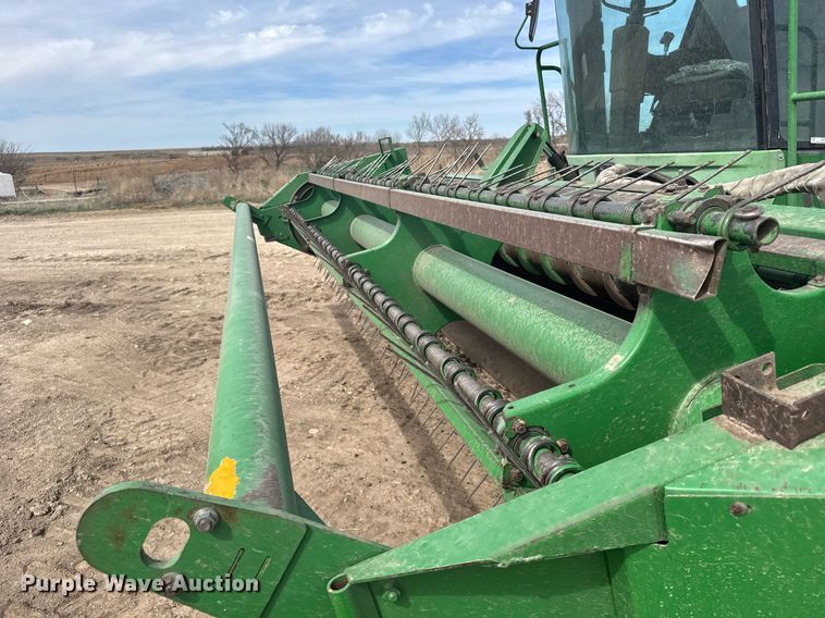 image for item NN9739 1999 John Deere 4890 SP swather / windrower