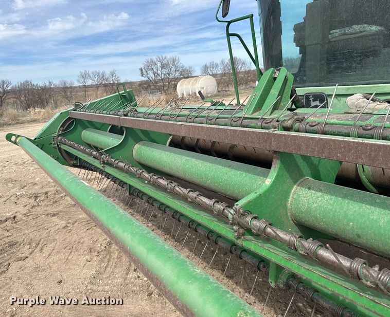 image for item NN9739 1999 John Deere 4890 SP swather / windrower