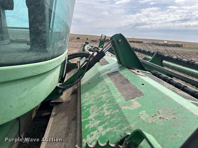 image for item NN9739 1999 John Deere 4890 SP swather / windrower