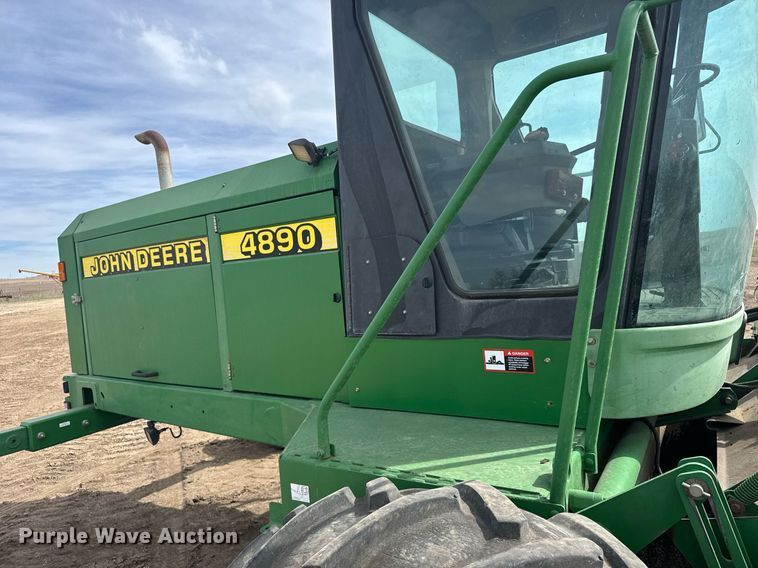 image for item NN9739 1999 John Deere 4890 SP swather / windrower