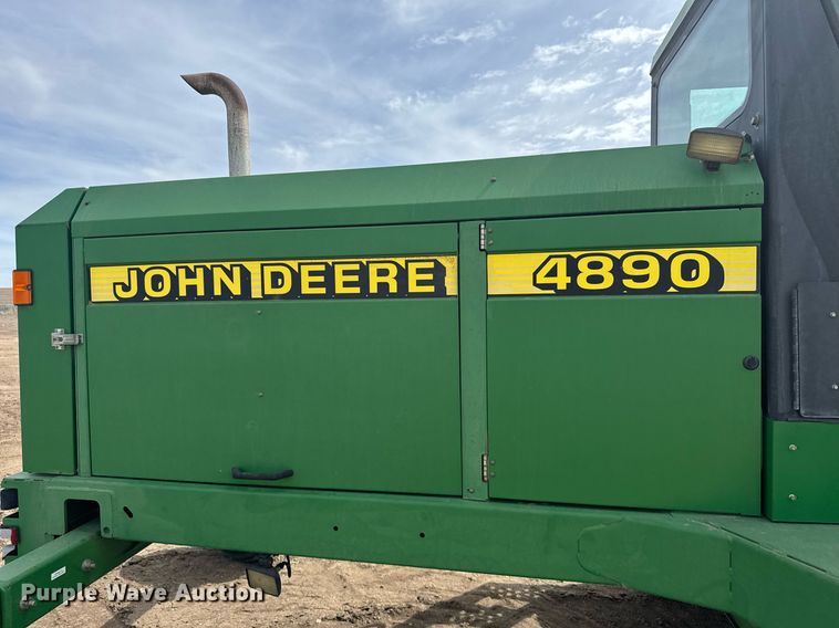 image for item NN9739 1999 John Deere 4890 SP swather / windrower