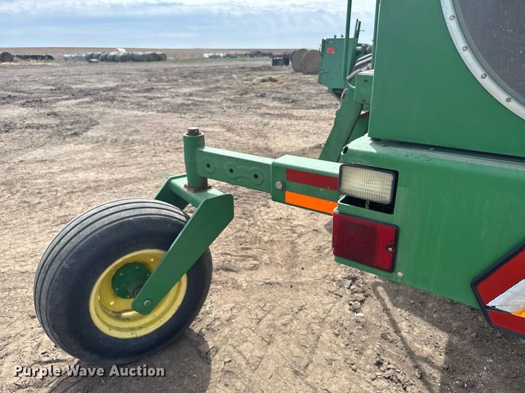 image for item NN9739 1999 John Deere 4890 SP swather / windrower