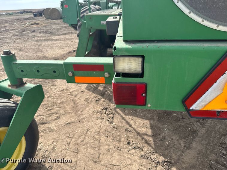 image for item NN9739 1999 John Deere 4890 SP swather / windrower