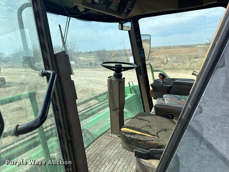 image for item NN9739 1999 John Deere 4890 SP swather / windrower