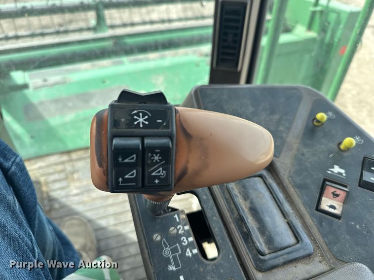 image for item NN9739 1999 John Deere 4890 SP swather / windrower