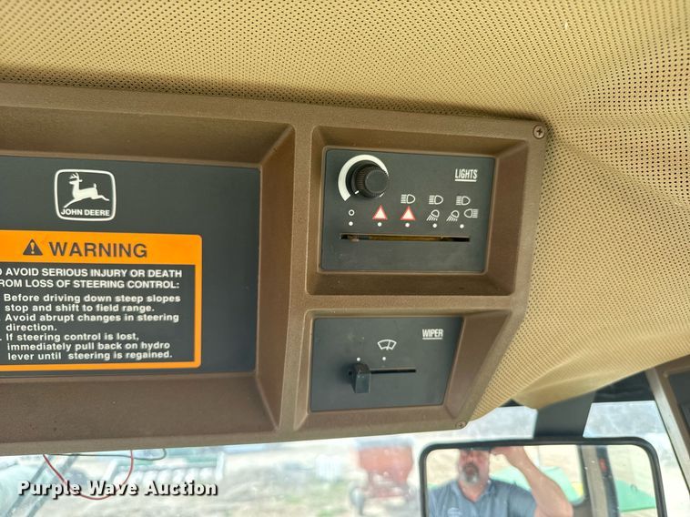 image for item NN9739 1999 John Deere 4890 SP swather / windrower