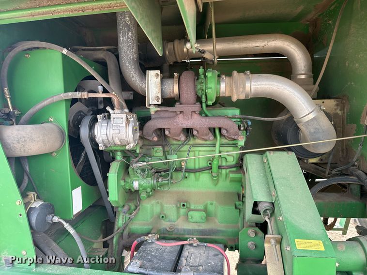 image for item NN9739 1999 John Deere 4890 SP swather / windrower