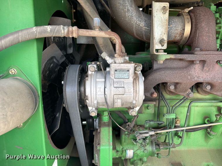 image for item NN9739 1999 John Deere 4890 SP swather / windrower