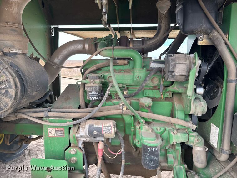 image for item NN9739 1999 John Deere 4890 SP swather / windrower