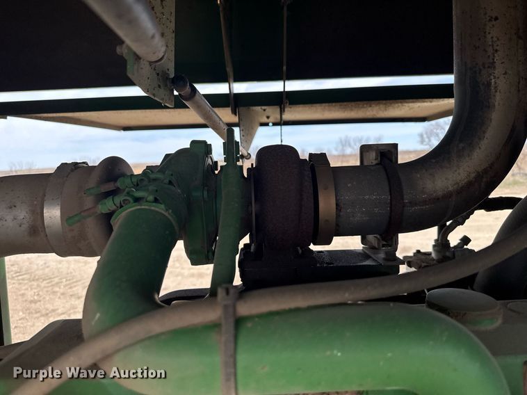 image for item NN9739 1999 John Deere 4890 SP swather / windrower