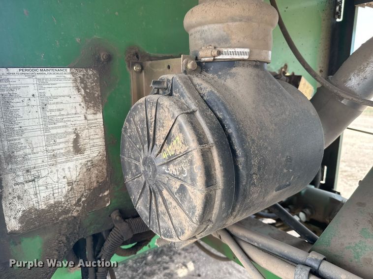 image for item NN9739 1999 John Deere 4890 SP swather / windrower