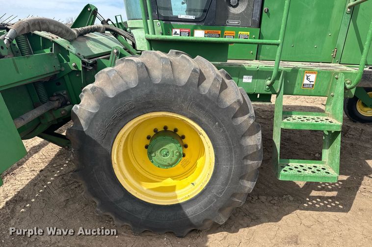 image for item NN9739 1999 John Deere 4890 SP swather / windrower