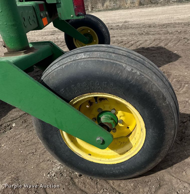 image for item NN9739 1999 John Deere 4890 SP swather / windrower