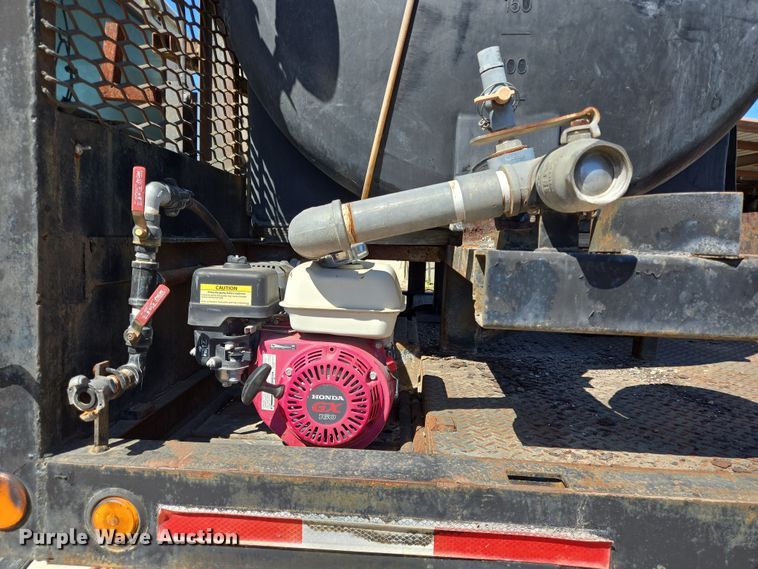 image for item DV1329 2006 Mack CNX613 rollback truck