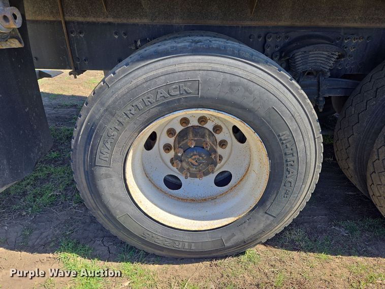 image for item EN8818 2008 Sterling L-Line flatbed truck