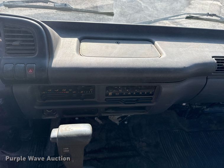 image for item DM5620 2004 Isuzu NPR flatbed truck