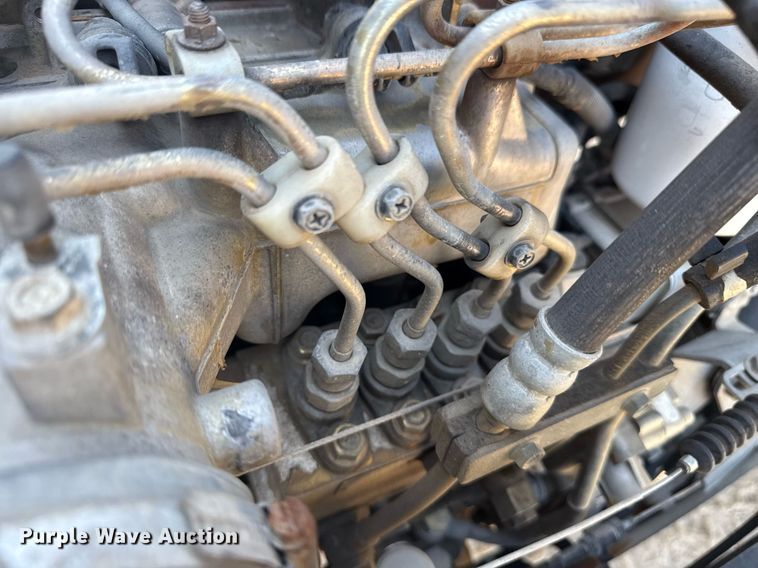 image for item DM5620 2004 Isuzu NPR flatbed truck