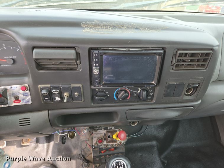 image for item EC4156 2004 Ford F650 Super Duty rollback truck