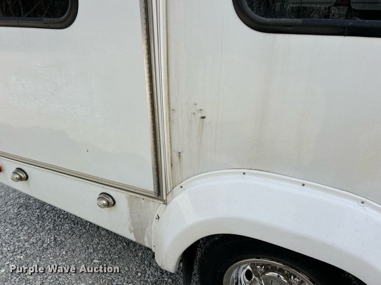 image for item EK2786 2011 Ford E350 Super Duty shuttle bus