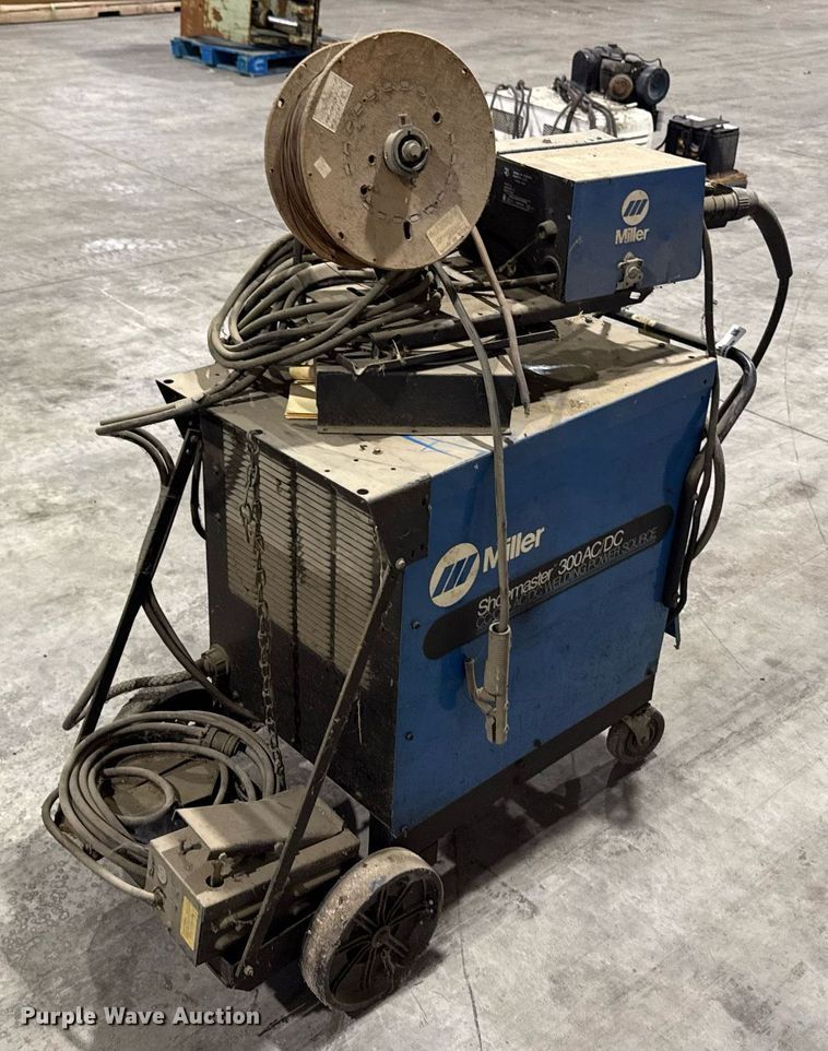 image for item EM3734 Miller Shopmaster 300 AC/DC welder