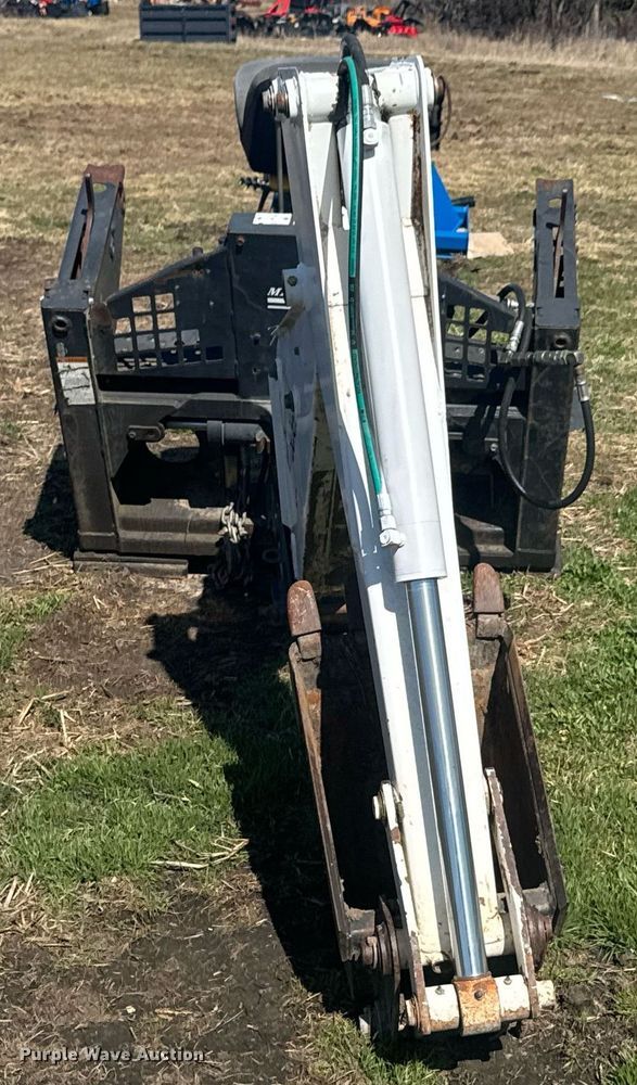 image for item DO0667 Bobcat 709 skid steer backhoe