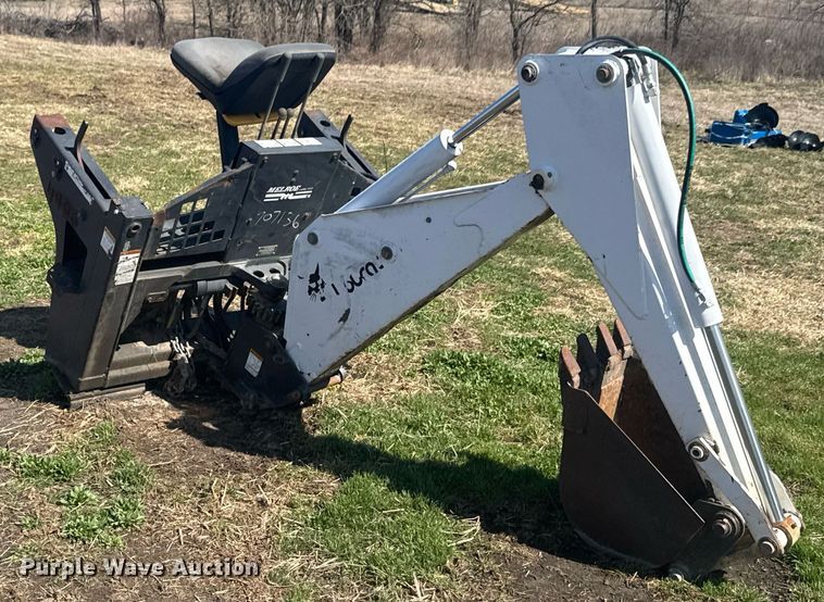 image for item DO0667 Bobcat 709 skid steer backhoe