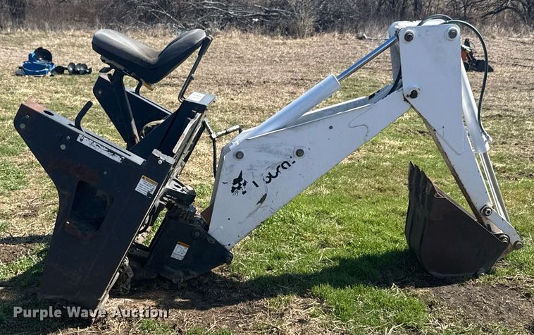 image for item DO0667 Bobcat 709 skid steer backhoe