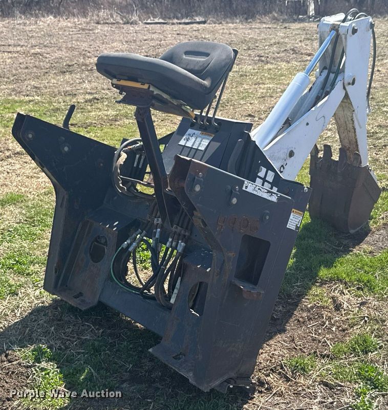 image for item DO0667 Bobcat 709 skid steer backhoe